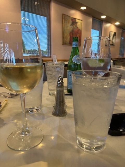 Dining tables with drinks.