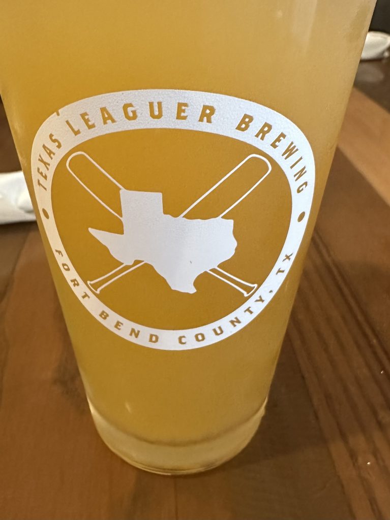 Pint of Pineapple cider by Austin Eastciders