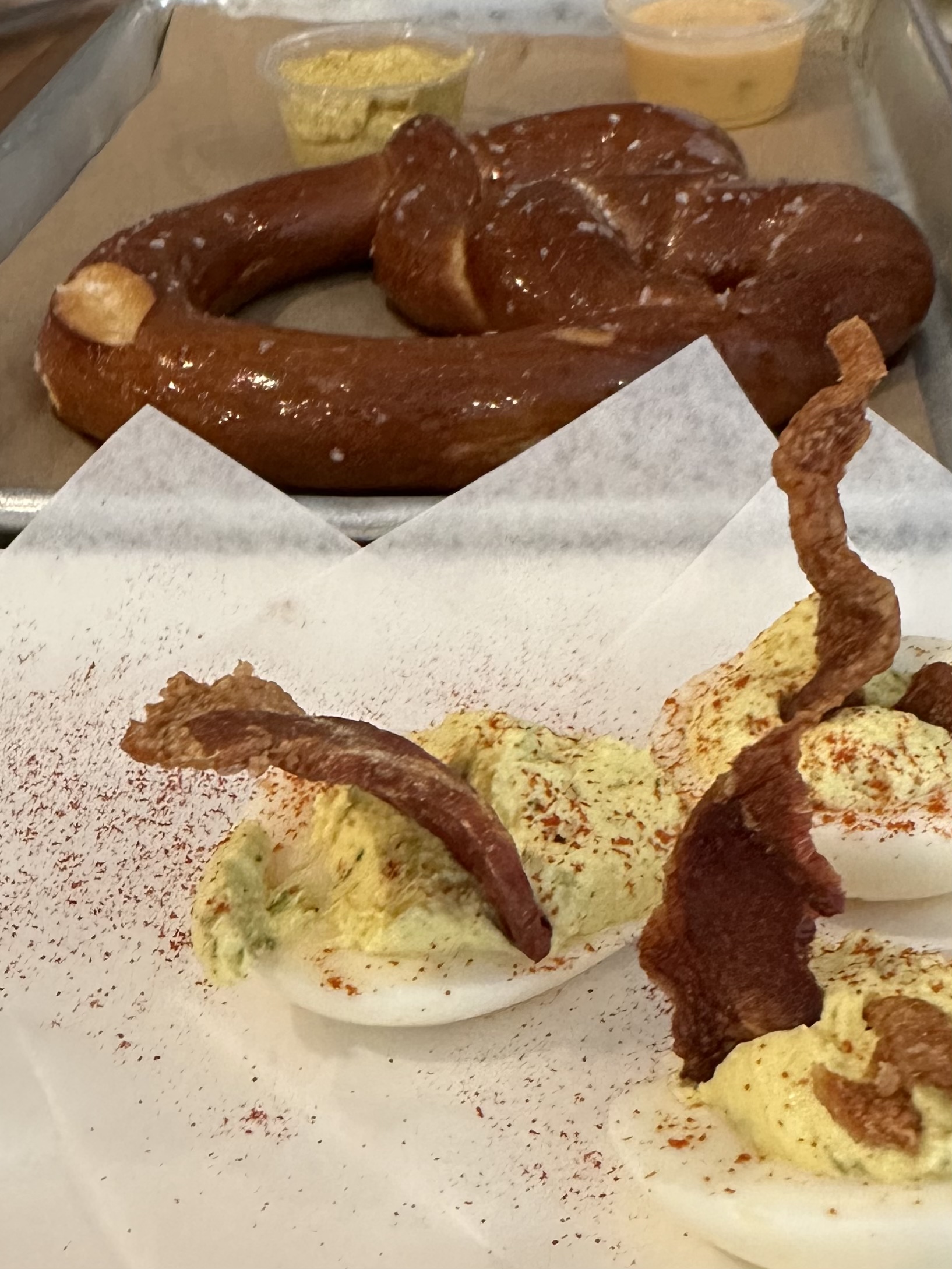 Pretzel and deviled eggs.